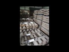 Presente para usted los revestimientos de carcasa de molino de bolas de acero con alto contenido de manganeso y el tablero de revestimiento magnético